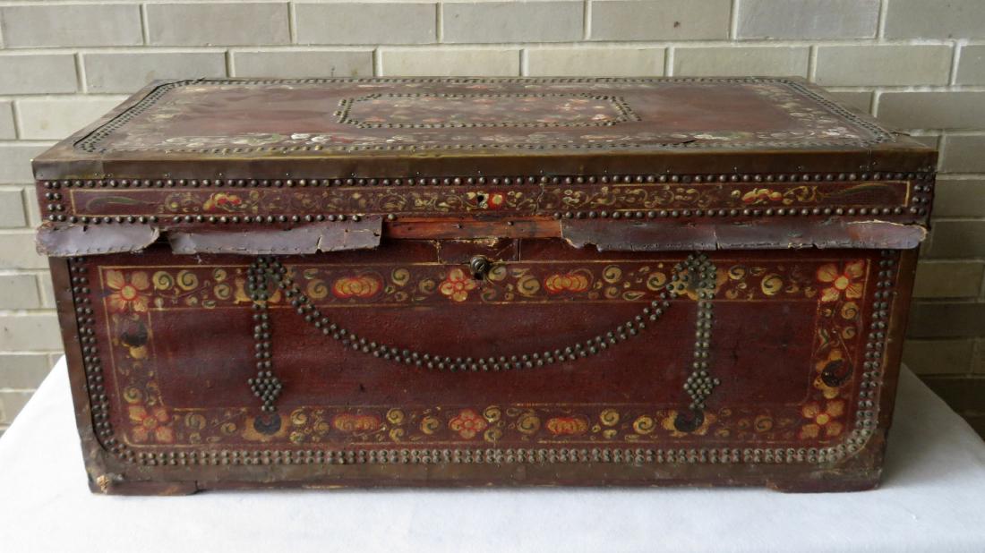 Early leather bound camphor wood storage box heavily: Early leather bound camphor wood storage box heavily decorated with hand painted flowers on 3 sides - original brass tack borders around paintings and brass straps around perimeter - brass handles on