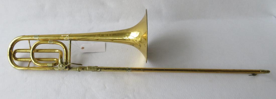 Bass Trombone - C.G. Conn Ltd - Elkhart Ind., Model: Bass Trombone - C.G. Conn Ltd - Elkhart Ind., Model 70H. Single rotor, F attachment, tuning in the slide, 9" bell. No case. Serial Number 403106. Condition: Works but rotor not attached and needs rest