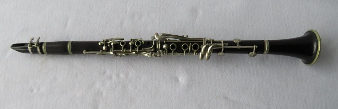 Clarinet - Signed Philipe in a dark wood. Comes with: Clarinet - Signed Philipe in a dark wood. Comes with hard case. Serial Number H12202. Condition: Pads unchecked and untested but appears to be in very good condition.