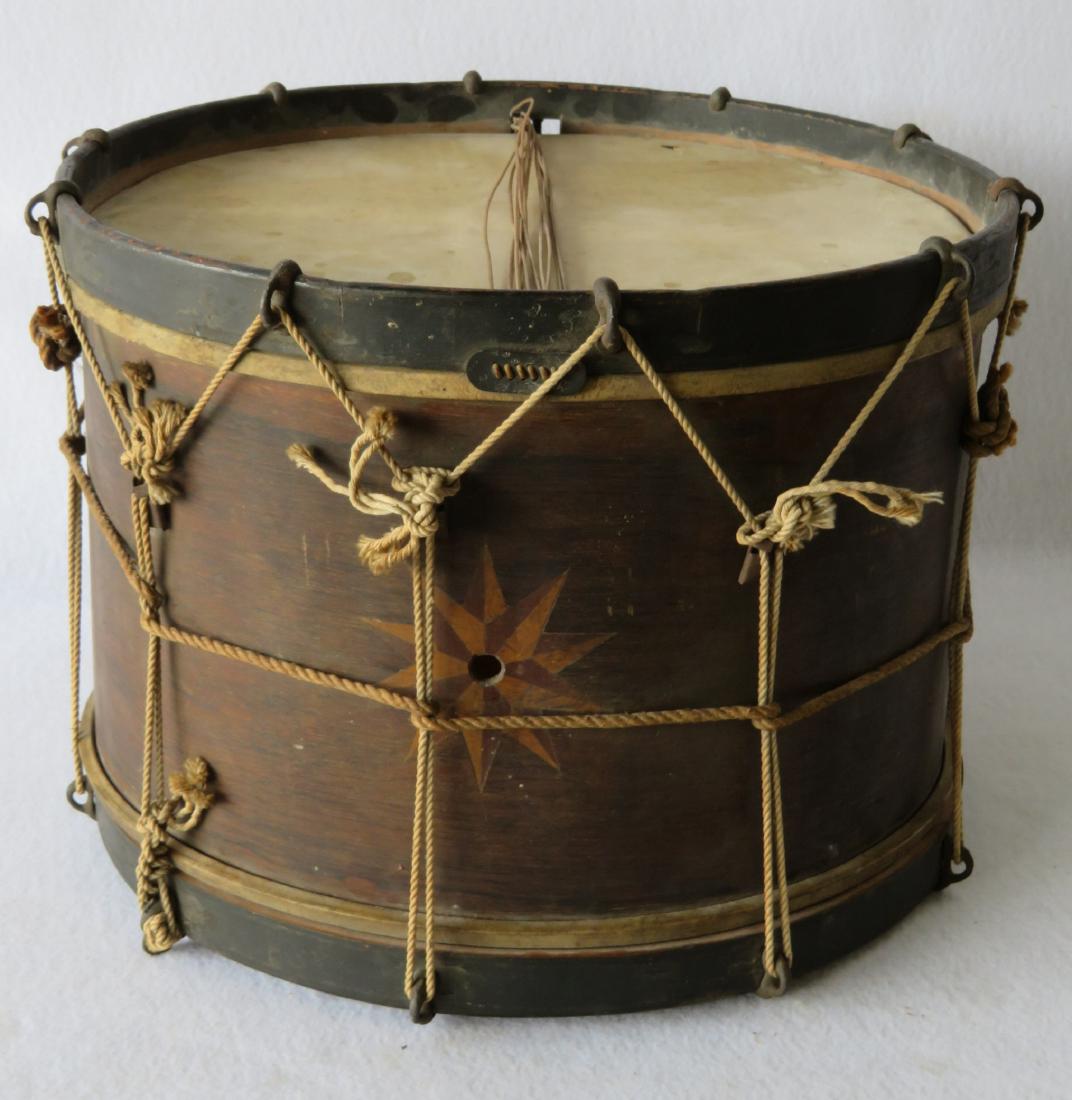 J. Howard Foote drum, 19th century with mariner's: J. Howard Foote drum, 19th century with mariner's compass inlay on side. Interior paper label signed "J. Howard Foote / Manufacturers and Importer of / Band Instrument". Located in NY and Chicago. Cir