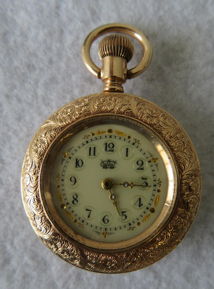 Lady's 10K gold pendant set pocket watch with an: Lady's 10K gold pendant set pocket watch with an enameled gold painted face which is in original excellent condition (not marked, but tested to be 10K) - signed Addison on the movement and WCW monogra