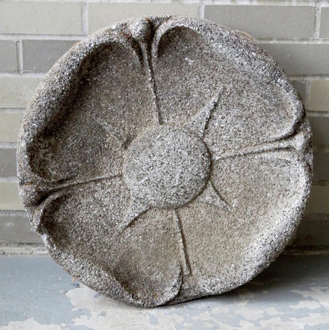 Early cut stone wheel shaped garden ornament having a (1 of 2)