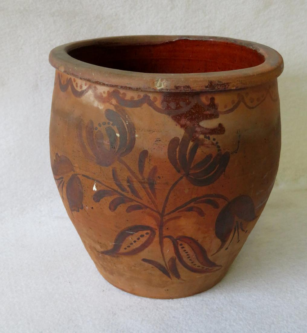 Unglazed redware jar decorated in blue with tulips and (1 of 5)