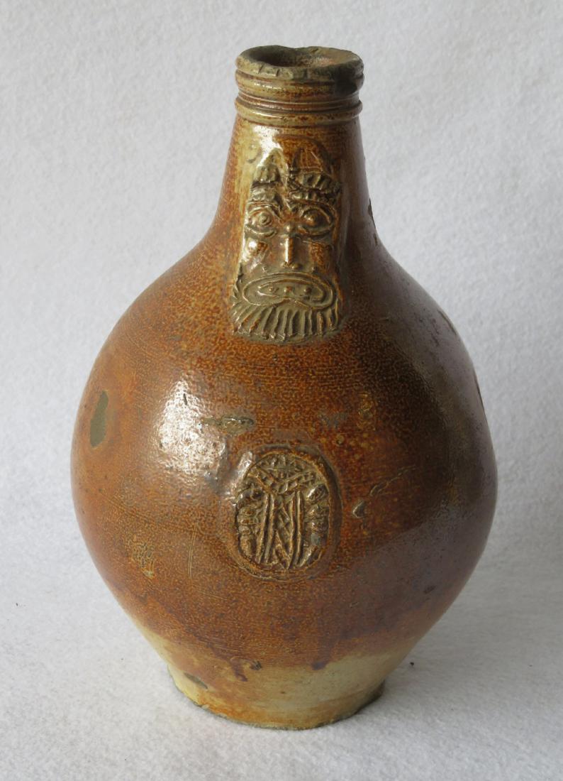 German Bellarmine stoneware ovoid jug with bearded face (1 of 7)