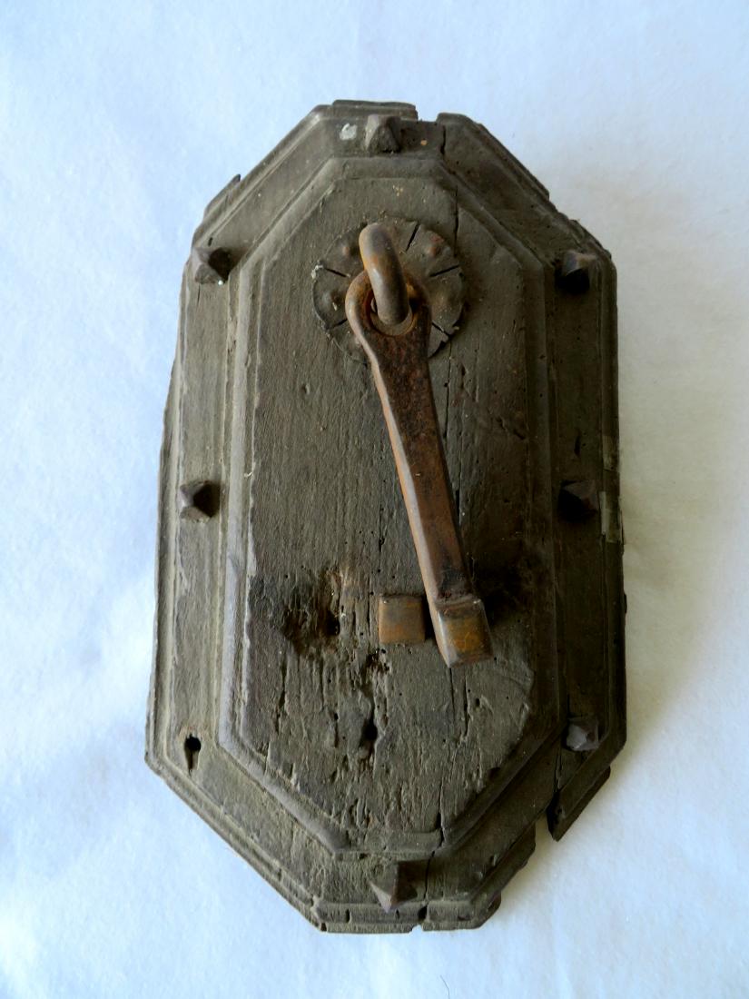 Primitive iron door knocker still mounted to part of an (1 of 4)