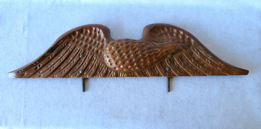 Hand carved wooden spread wing eagle wall plaque in an (1 of 3)