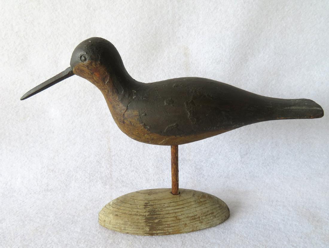 Shorebird decoy with over paint and traces of original (1 of 5)
