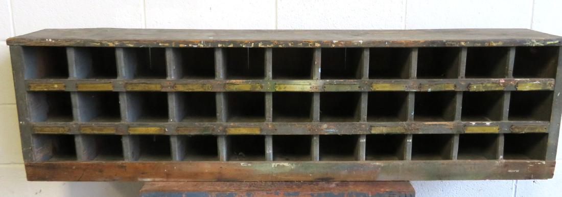 Primitive cubby hole unit/parts bin that probably sat (1 of 5)