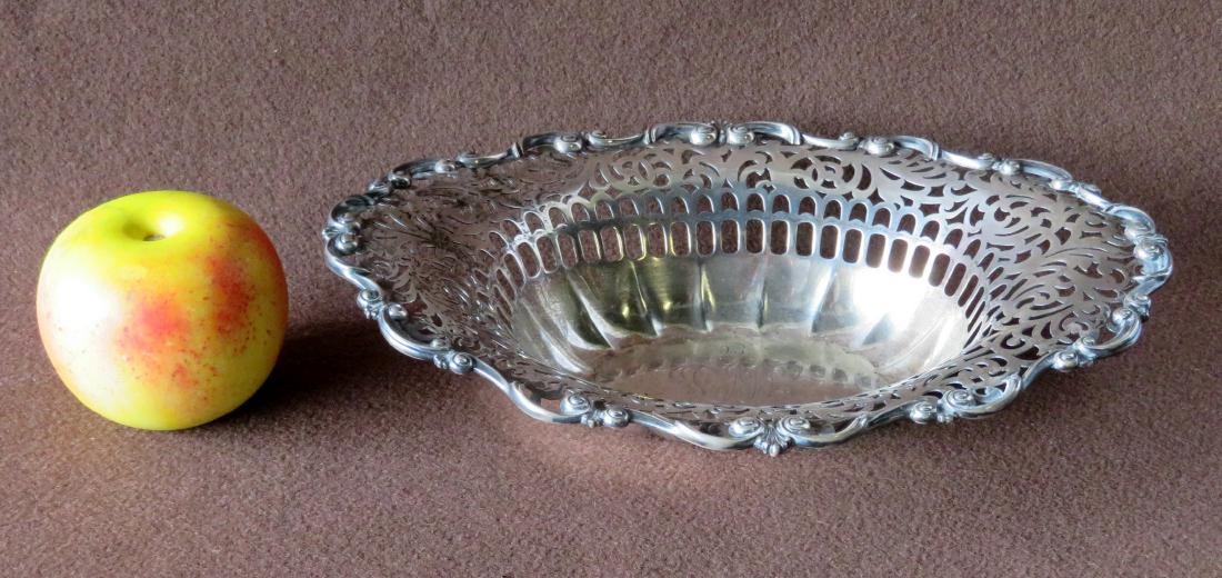 Sterling silver bowl with scalloped and reticulated: Sterling silver bowl with scalloped and reticulated border signed Theodore B. Starr New York - monogram in base - very good condition - 10.75" x 2.25" - 9.1 troy ounces.