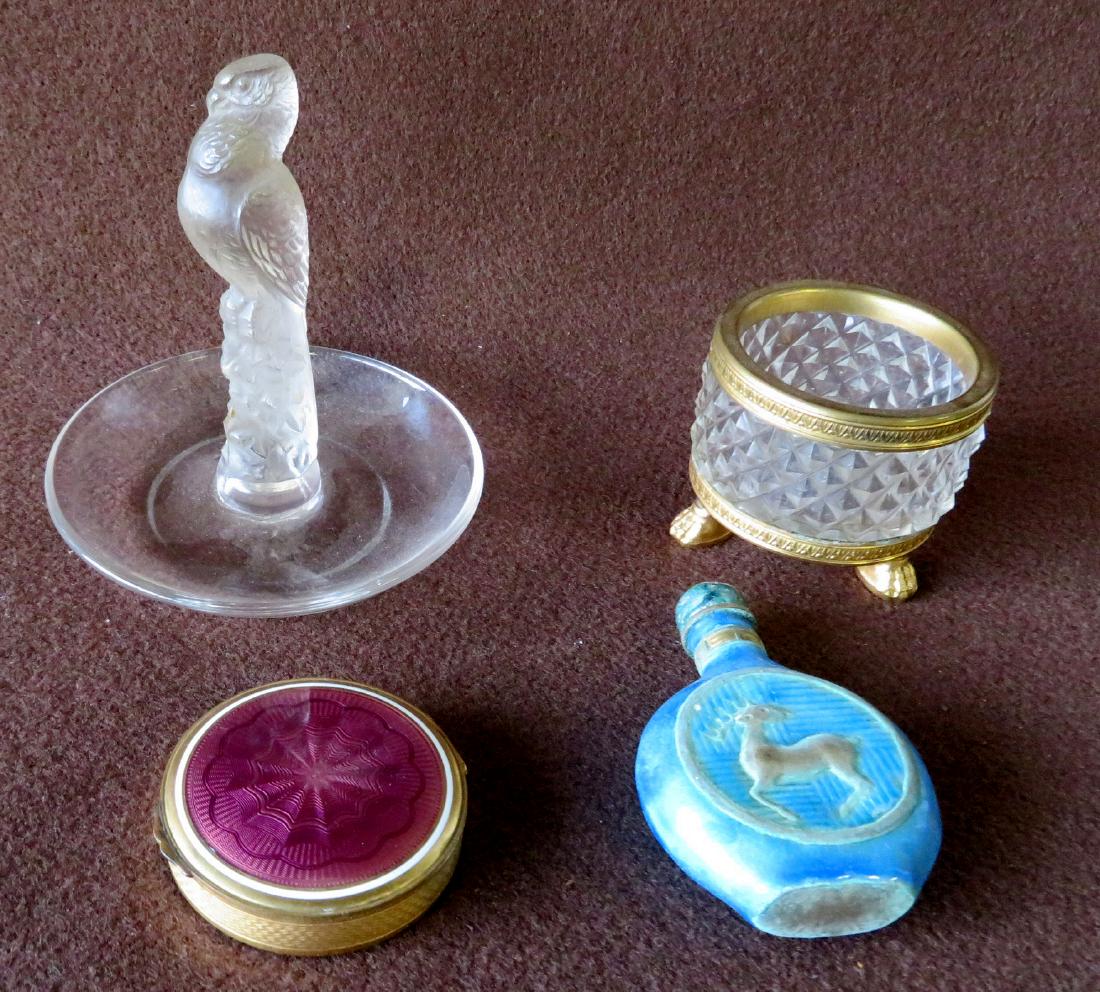 Grouping of decorative objects including a signed: Grouping of decorative objects including a signed "Lalique France" ring holder in the form of a bird on stump - 4.25"H, an enameled snuff bottle decorated with a stag, a lady's gold powder compact wit