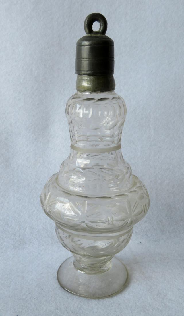Early cut glass bottle with applied footed base having (1 of 3)