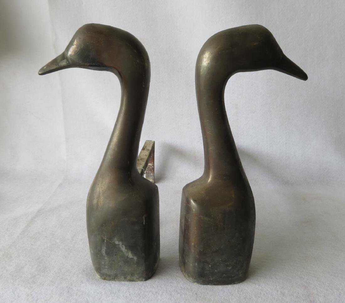 Pair of goose head form bronze andirons signed Kortz (1 of 2)