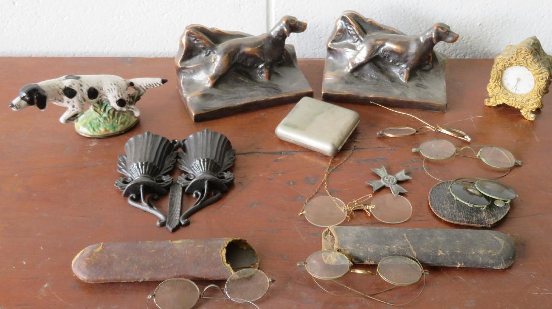 Grouping of decorative objects including a pair of: Grouping of decorative objects including a pair of sporting dog bronze clad bookends, a sporting dog bottle opener in original paint signed Scott Products - Newark NJ, a fancy Waterbury dresser clock