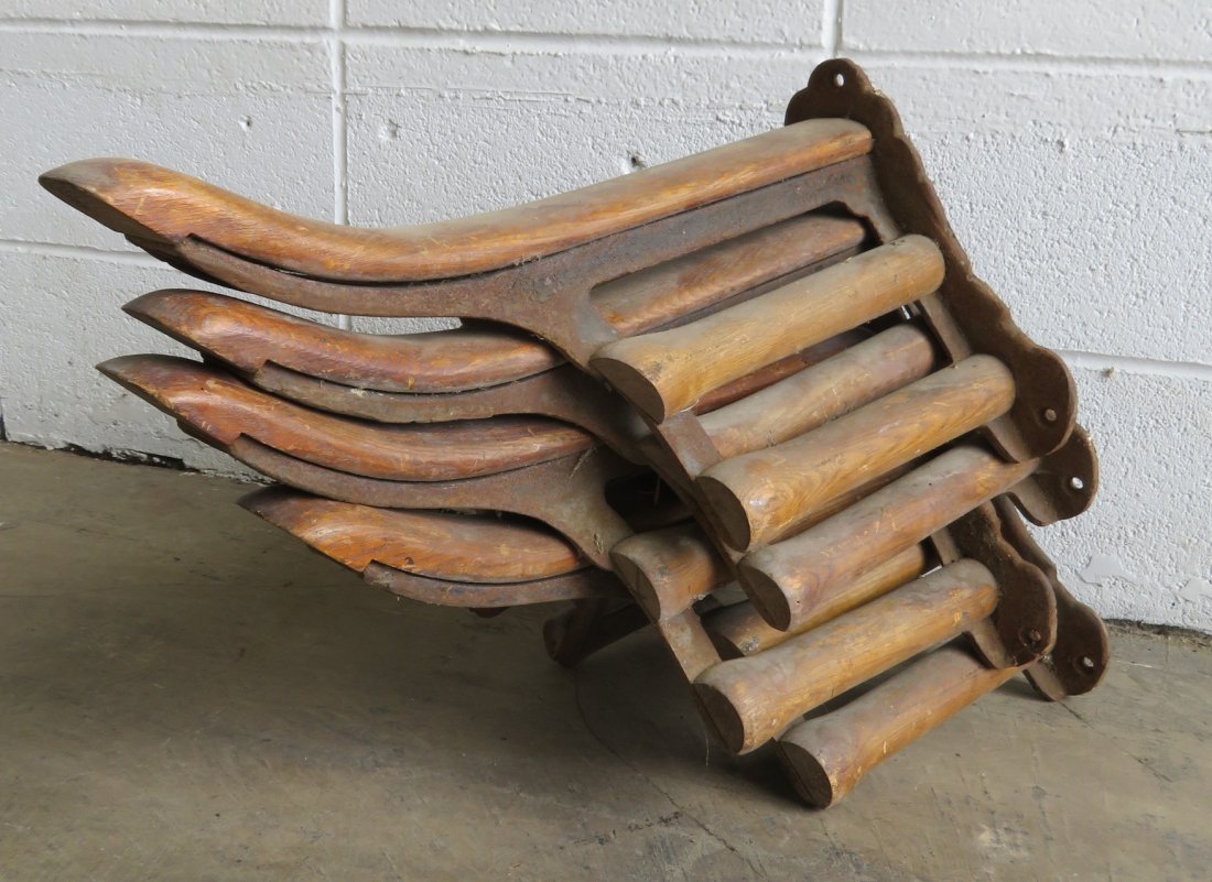 Four vintage wood & iron saddle holders.: Grouping of 4 old cast iron and wood saddle holders, late 19th to early 20th century. Not signed. Very good condition. 19.5"L x 9"H.
