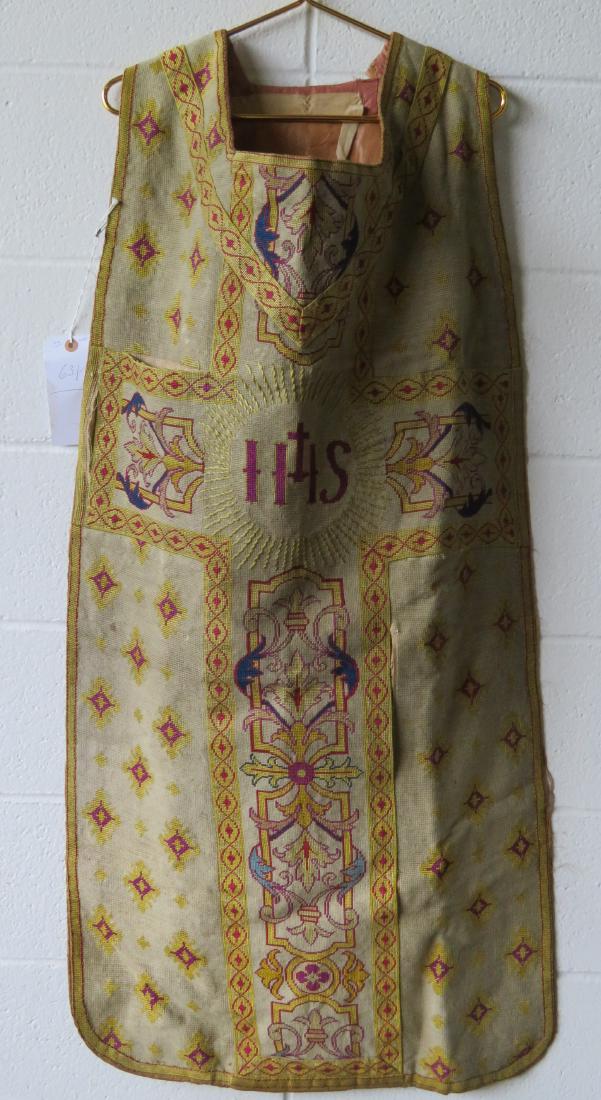 A minister's needlepoint vest decorated with religious: A minister's needlepoint vest decorated with religious & geometric designs and having a silk/satin backing, all hand sewn, late 19th century - 43"L x 23"W - some separation at several seams where sect