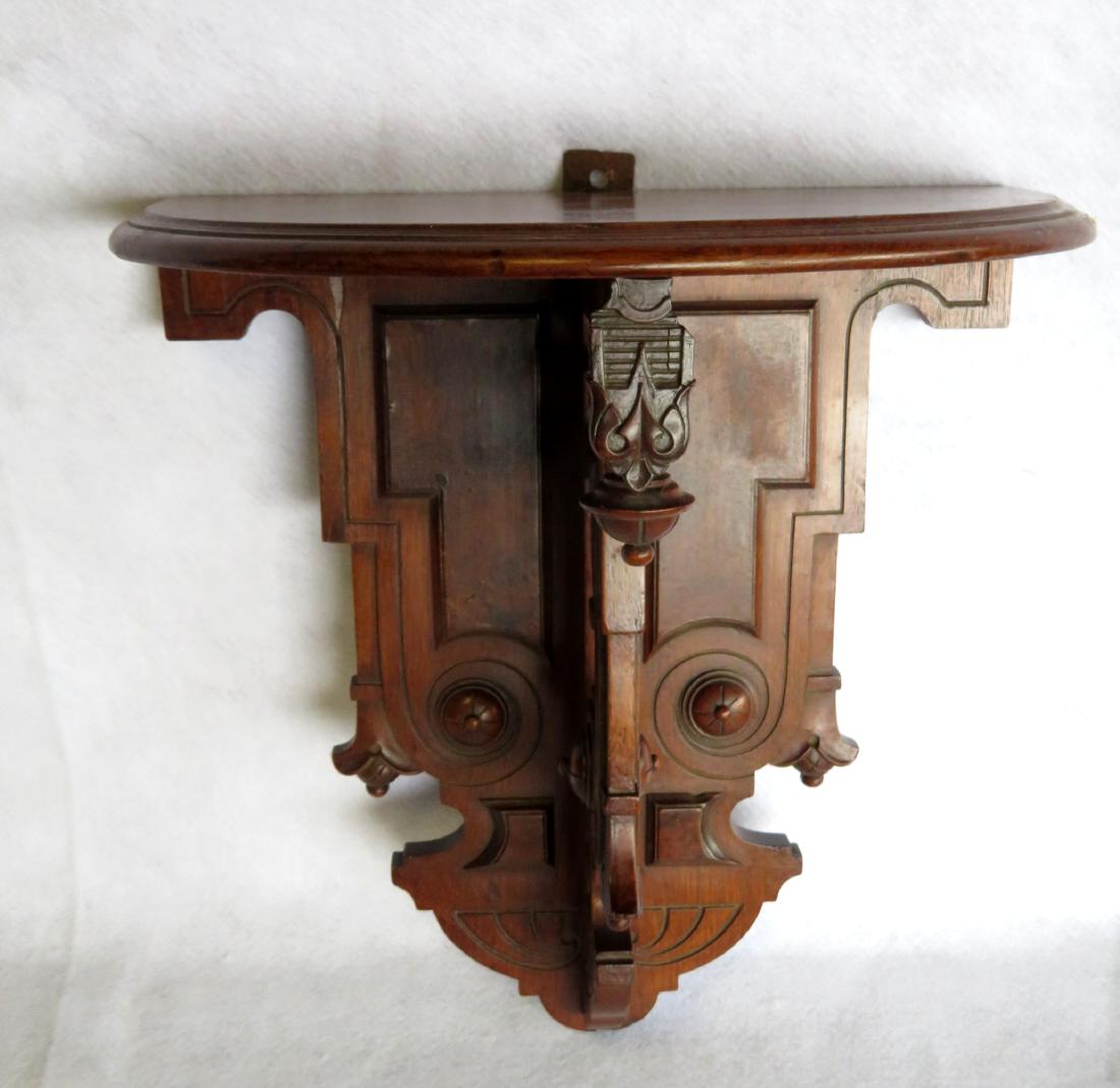Renaissance Revival black walnut wall shelf, circa: Renaissance Revival black walnut wall shelf, circa 1870. Very good condition. 18 1/2"W x 18"H x 11.5"D. Provenance: From a private collection of Country Americana and fine Decorative Arts of a retirin