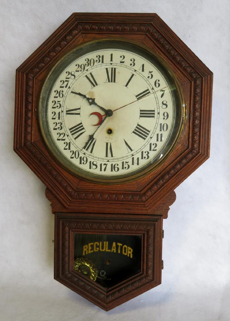 Sessions oak regulator calendar wall clock, with a