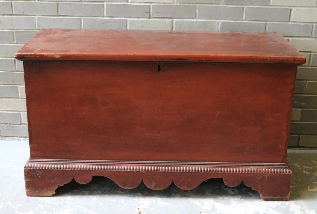 A good red and black grain painted cherry wood blanket: A good red and black grain painted cherry wood blanket box on a beautiful cutout bracket dovetailed base with gadrooning across the top - interior till - minor use wear to top, and overall very good c