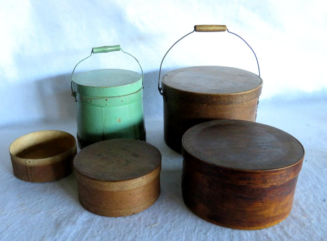 Grouping of firkins and pantry boxes including: Two: Grouping of firkins and pantry boxes including: Two firkins - the smaller in apple green - good condition, and the larger in pale green (loose banding on lid, minor losses); and 3 pantry boxes in natu