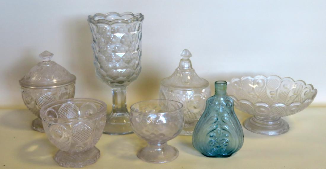 Grouping of 7 pieces of flint pattern glass, 19th: Grouping of 7 pieces of flint pattern glass, 19th century, ranging in size from 4"H to 10"H - the scroll aqua flask with a small hairline near ribbed side, otherwise all in very good condition. Proven