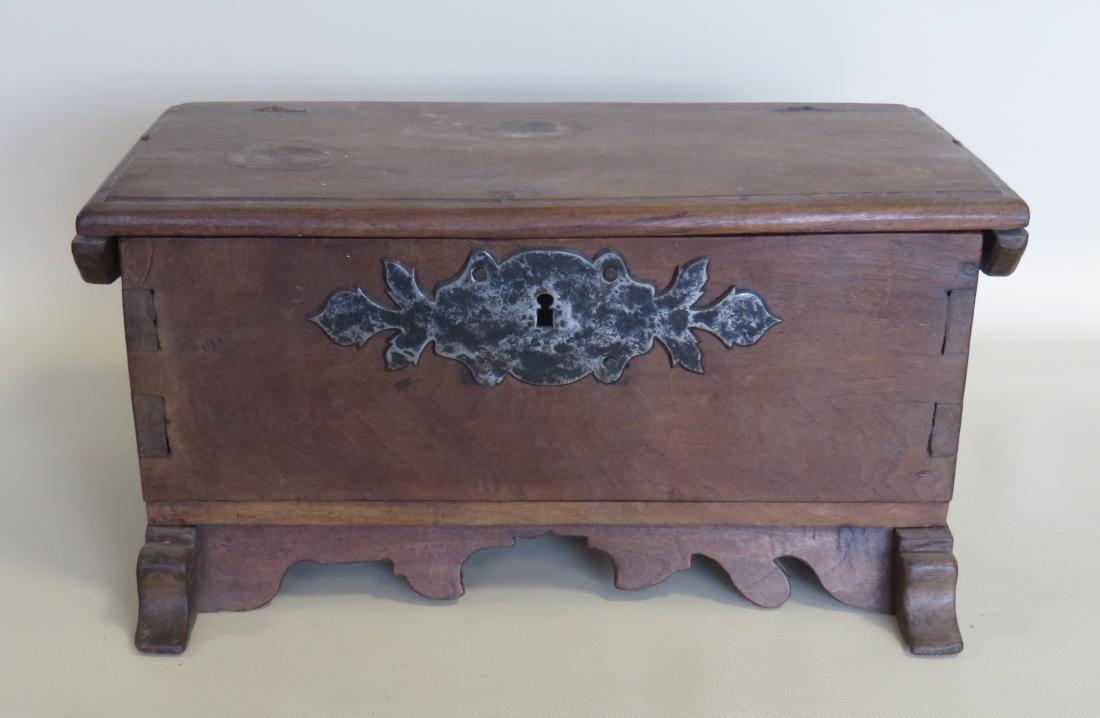 Early miniature continental blanket box with shoe feet,