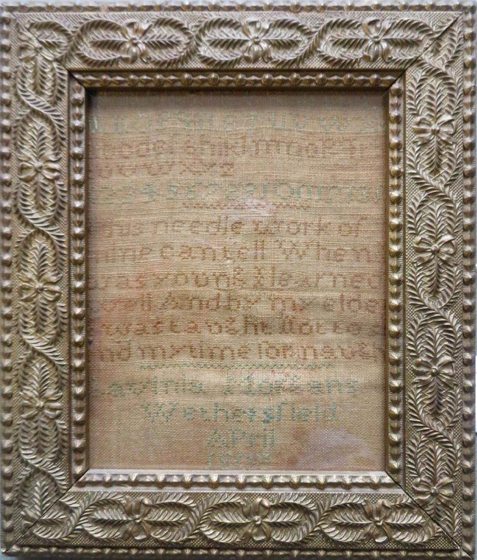 An alphabet and motto sampler. Appears to be signed: An alphabet and motto sampler. Appears to be signed "Lavinia Mo---ans / Wethersfield / April / 18 xx". The embroidered message reads "This needlework of mine can tell when I was young & learned well.