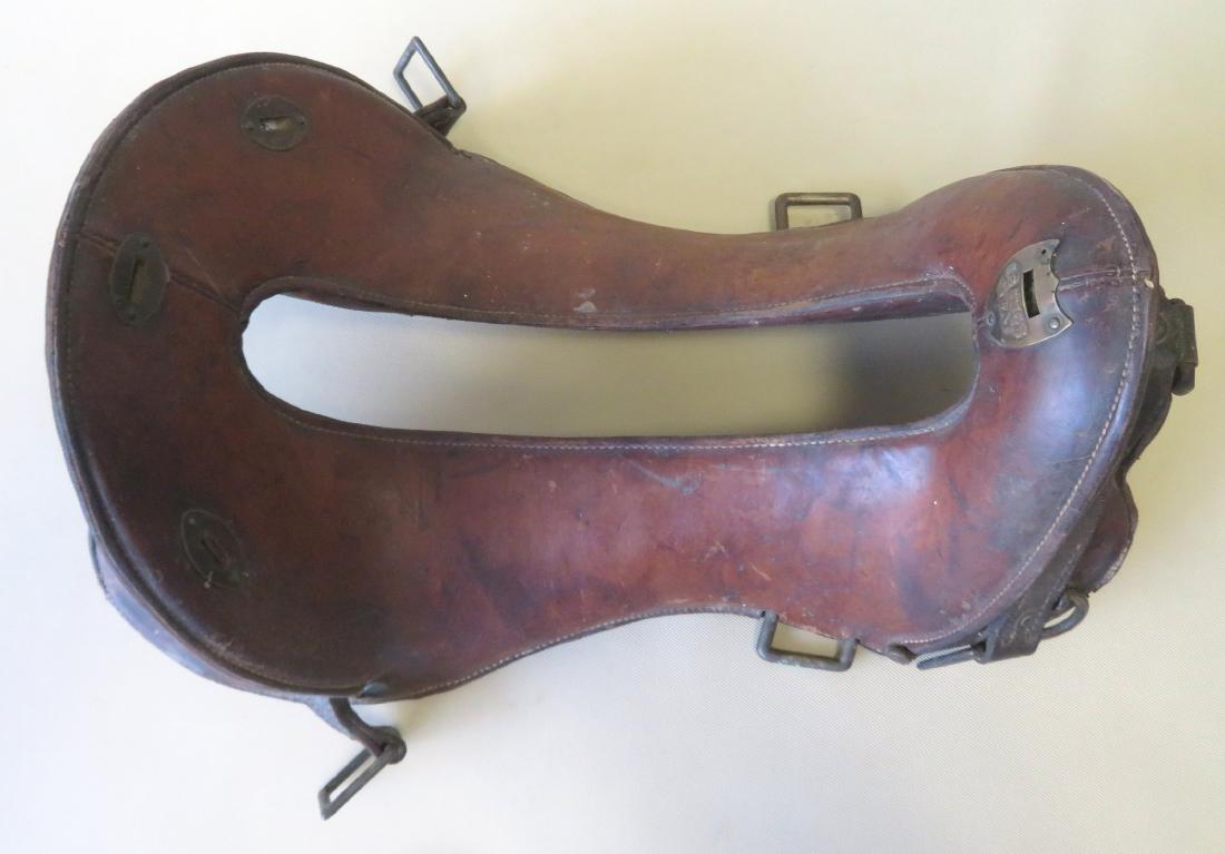 US Calvary Mc Clellen leather saddle with attached: US Calvary Mc Clellen leather saddle with attached brass shield marked "12 INCH SEAT" - The leather also branded B.C. & "WS-1918 / N.L.K." - Good condition.