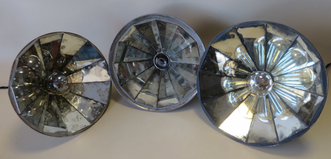 Three round colorless mirror back industrial lighting: Three round colorless mirror back industrial lighting fixtures, including 2 with original green paint on exterior of shades and one 1 nickel plated. The fixtures circa 1920-30. Two 2 have all new elec
