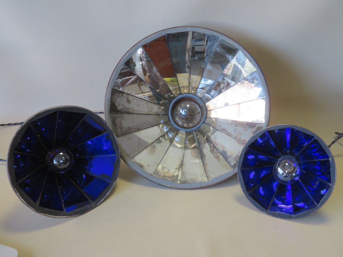 Three industrial mirror back lighting fixtures, 2 in: Three industrial mirror back lighting fixtures, 2 in blue and one colorless - none are signed. While the shades are vintage 1920-30, the fixtures themselves are new and professionally fitted with all 