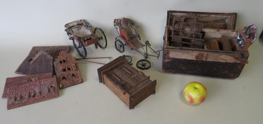 Grouping of damaged children's toys including a tin and: Grouping of damaged children's toys including a tin and wood bicycle driven 2 wheel cart (possibly an old Chinese pedi-cab), a wooden baby carriage, disassembled wooden stucco house model (exterior in