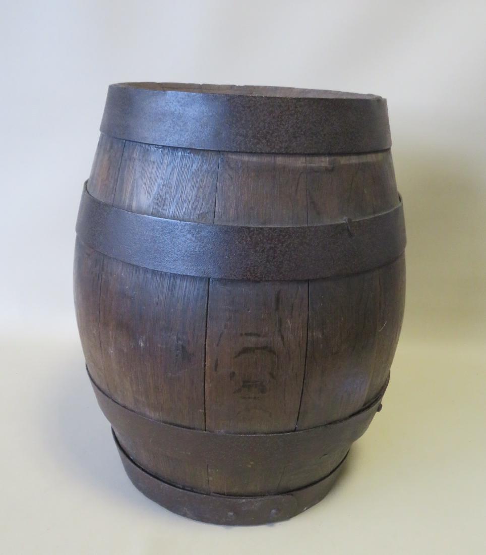 Oak beer keg stamped "John Kuhlmann Br'g Co. /: Oak beer keg stamped "John Kuhlmann Br'g Co. / Ellenville N.Y.". The John Kulmann Brewery Co. was the only brewery in Ellenville, starting operations in 1895 and closing in 1920. The hand forged iron 