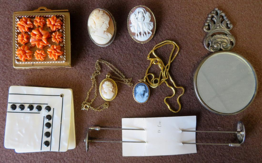 Grouping of lady's decorative objects including: 4: Grouping of lady's decorative objects including: 4 cameos (1 with 14k gold frame and 2 marked 800 silver) - all in very good condition; 2 pocket mirrors including one in silver marked "Denmark" and on