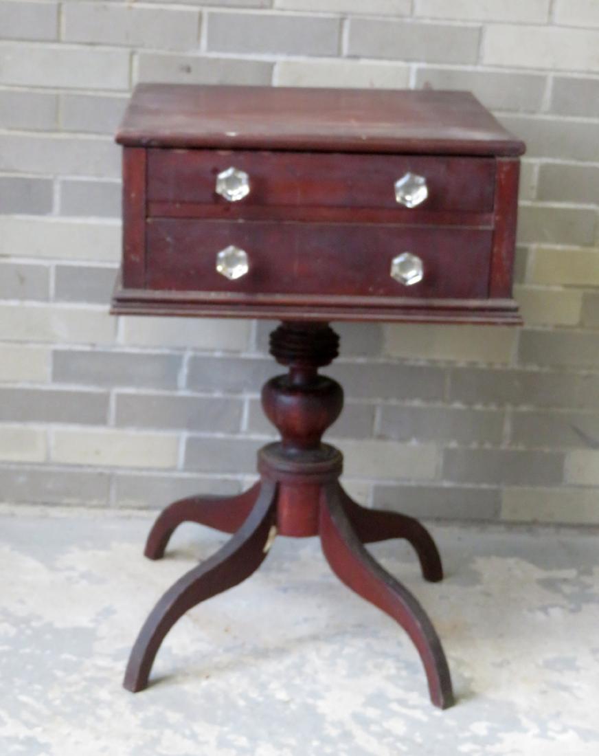 A country Hepplewhite 2 drawer sewing stand, turned: A country Hepplewhite 2 drawer sewing stand, turned pedestal over 4 spider legs. The top with shrinkage crack and replace pulls. Overall good condition, early 19th century. Note the script inscription