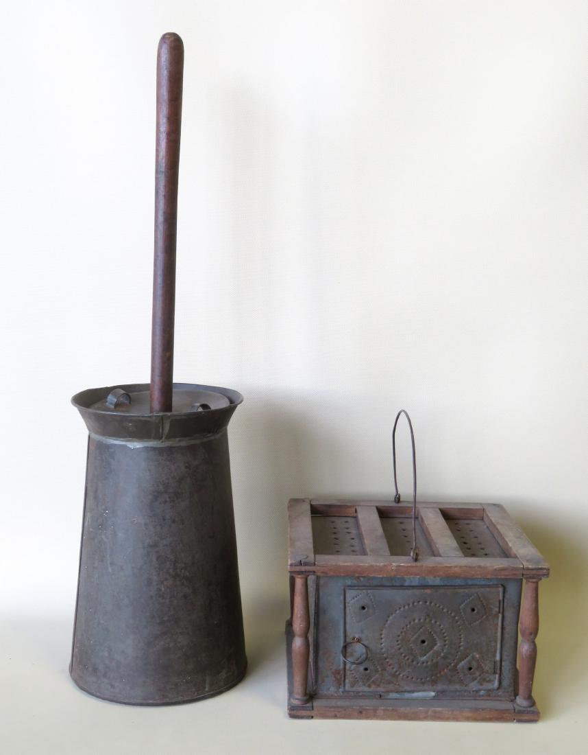 Two country items including a pierced tin foot warmer: Two country items including a pierced tin foot warmer with original interior tinder box, and a toleware table-top butter churn, possibly Shaker - 23"H to top of wooden handle of churn. Both very good 