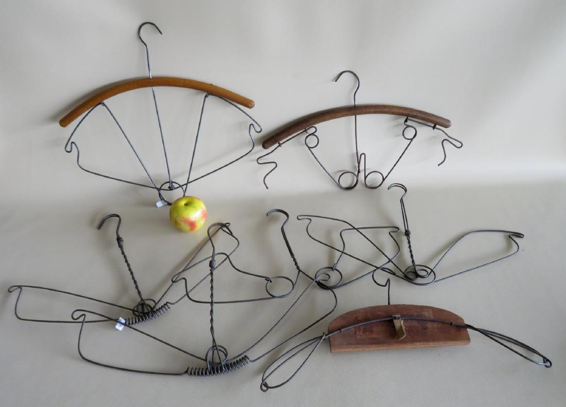 Grouping of 7 vintage wire coat hangers, late 19th to: Grouping of 7 vintage wire coat hangers, late 19th to early 20th century - the largest 17 1/2"W x 16"H. All in very good condition. Provenance: Sandra (Suzie) Buhalis-Mackintosh estate, Woodstock NY 1
