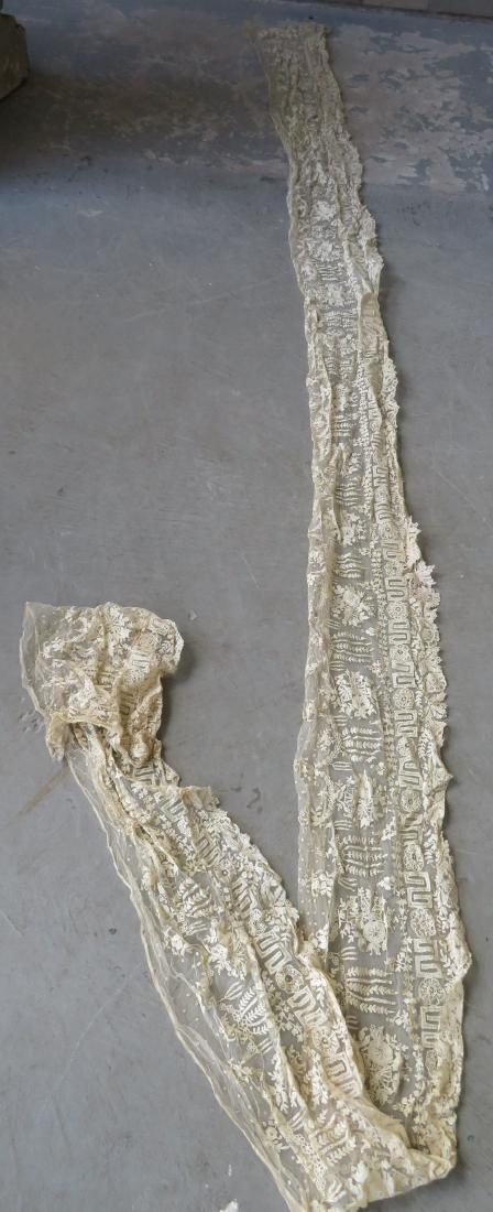 Grouping of mostly lace articles including: A lace: Grouping of mostly lace articles including: A lace dress - 43"L - very good condition; a large section of blue lace, one edge is scalloped, the other straight - 16' 6" x 30"W - some breaks in the lace
