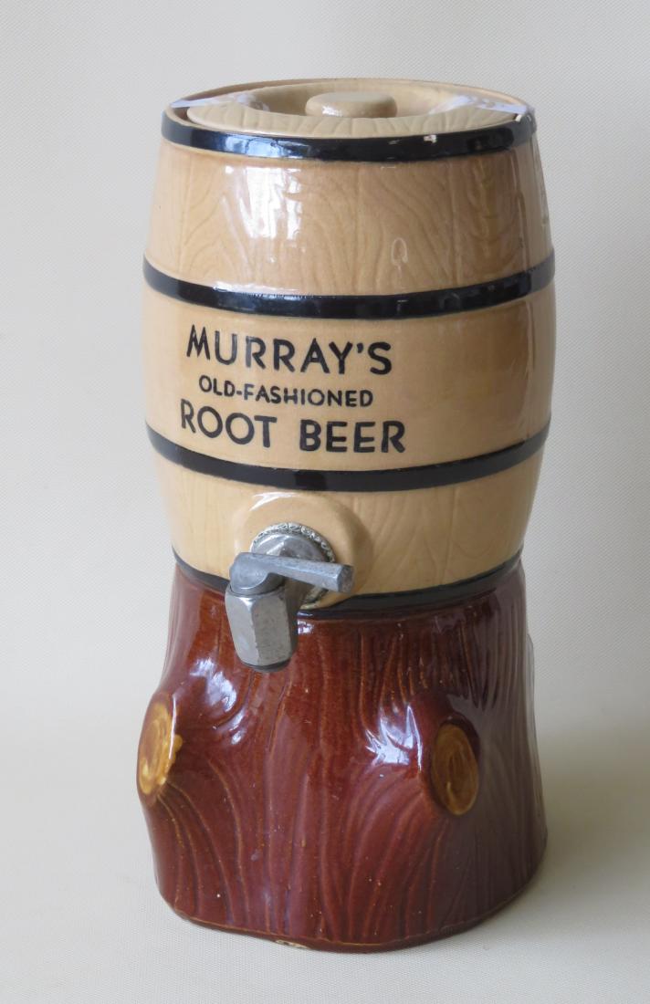 Advertising porcelain root beer dispenser stamped: Advertising porcelain root beer dispenser stamped "Murray's Old-Fashioned Root-Been" - Very good condition. 12 1/2"H x 6 3/4"W - stamped on interior of base "Cordley & Hayes NY.". Two slight flakes on