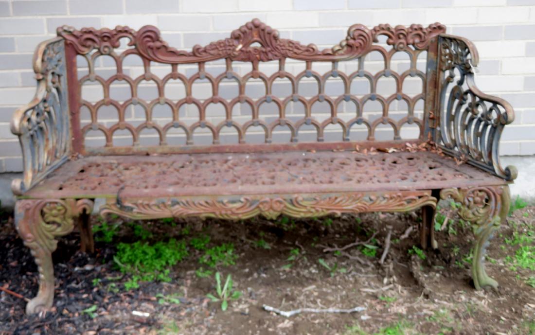 Cast iron garden settee, "White House Rose Garden": Cast iron garden settee, "White House Rose Garden" pattern with openwork scrolls and flowers in seat and a series of openwork arches across back, scrolled arms, leaf and floral apron, and cabriole leg