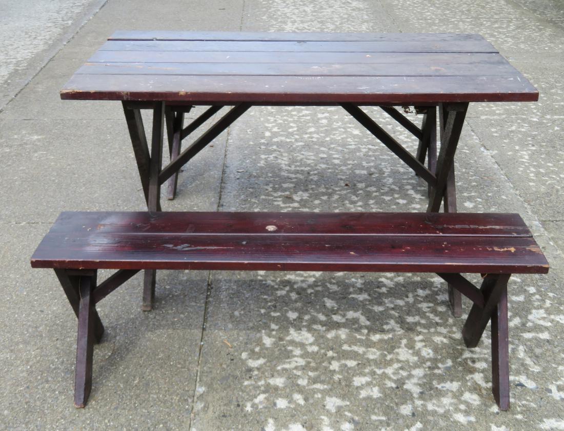 Old wooden picnic table and 2 matching benches, good: Old wooden picnic table and 2 matching benches, good condition, circa 1970. The table 48"L x 28"W x 29"H.
