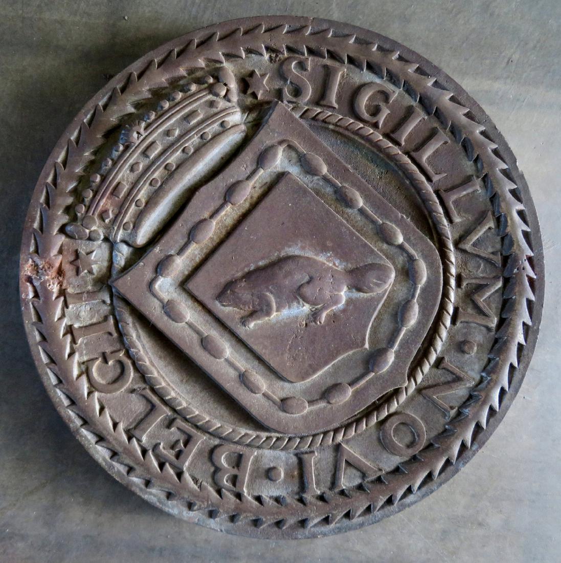 A circular cast iron NYC seal, likely from the West: A circular cast iron NYC seal, likely from the West Side Highway, New York City or from a NYC building where they were also mounted, circa 1930 - traces of original silver paint - note a tight hairlin