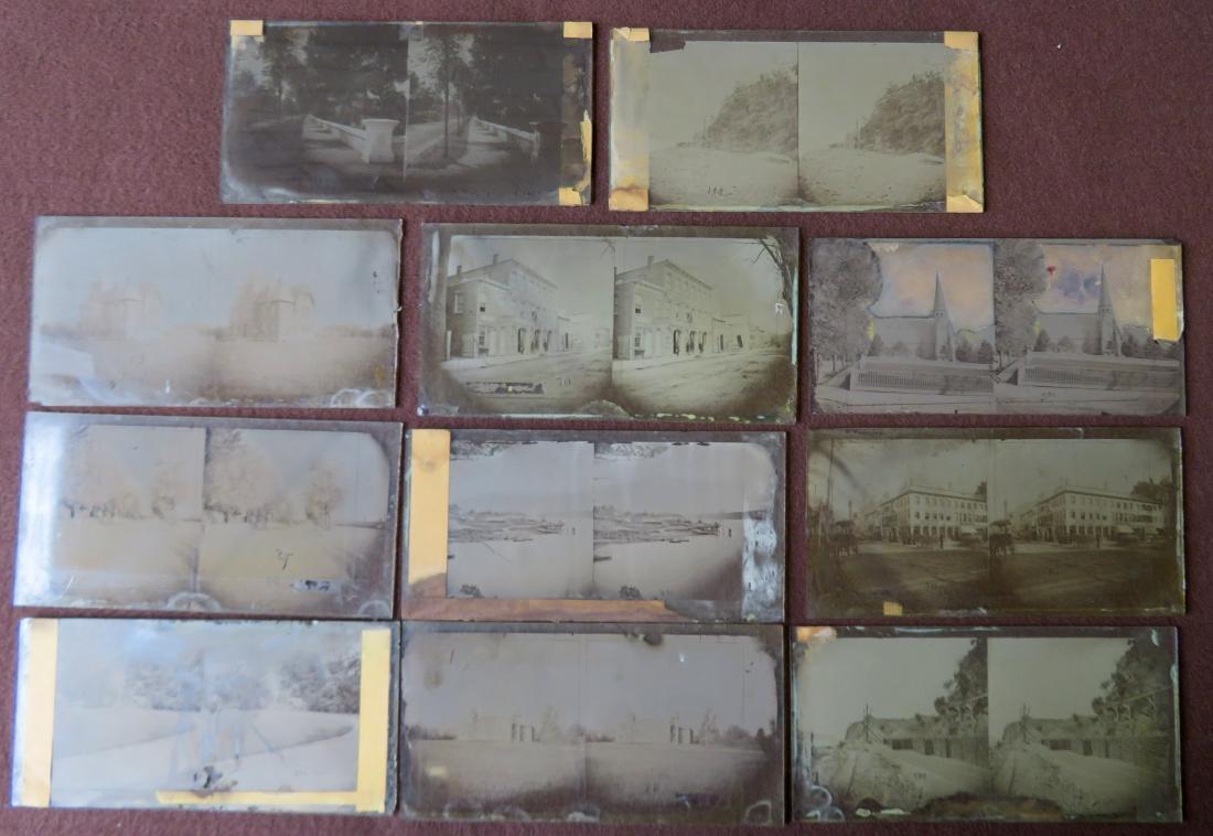 Collection of 11 glass negative stereocard photos: Collection of 11 glass negative stereocard photos including buildings & church, RR construction site, street scene with horse and buggies and building sign that appears to read "American Express Co.",