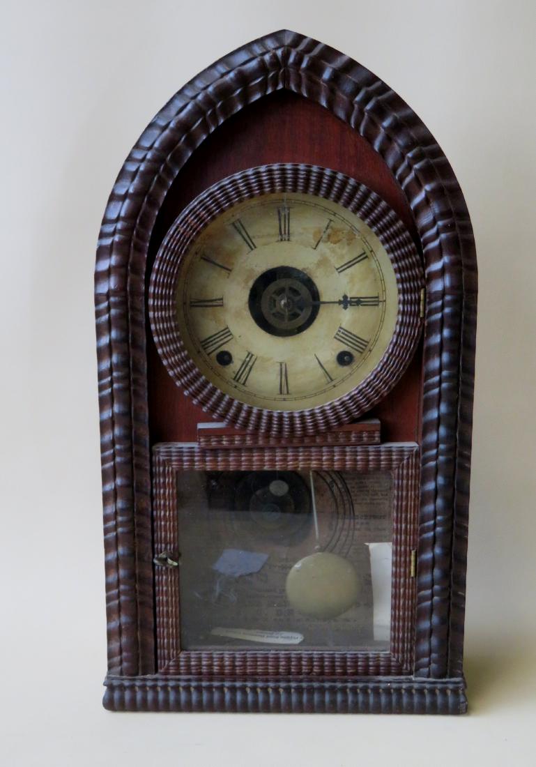 Ripple front Gothic beehive shaped mantle clock 8 day: Ripple front Gothic beehive shaped mantle clock 8 day with chimes, signed J.C. Brown - Bristol Conn. - 18 3/4"H. The clock is complete, but sold as non-running.