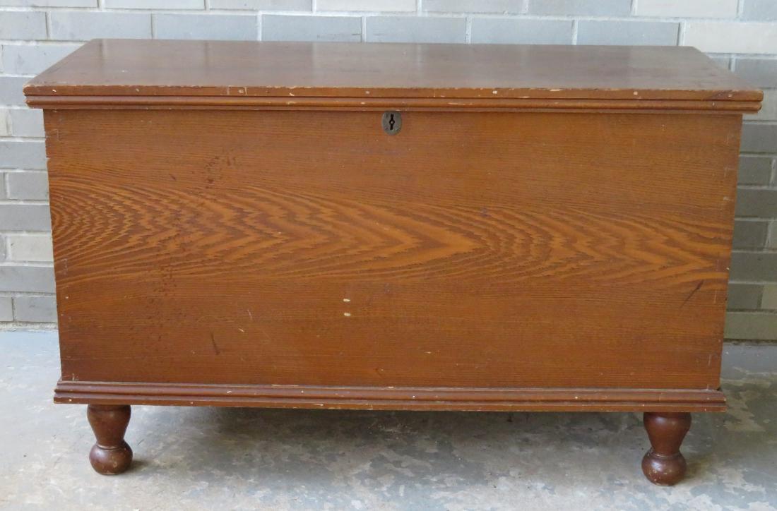 Good Pennsylvania grain painted blanket box with turned: Good Pennsylvania grain painted blanket box with turned feet and poplar wood construction. 44"W x 20 1/4"D x 27"H. Very good condition. Circa 1850.