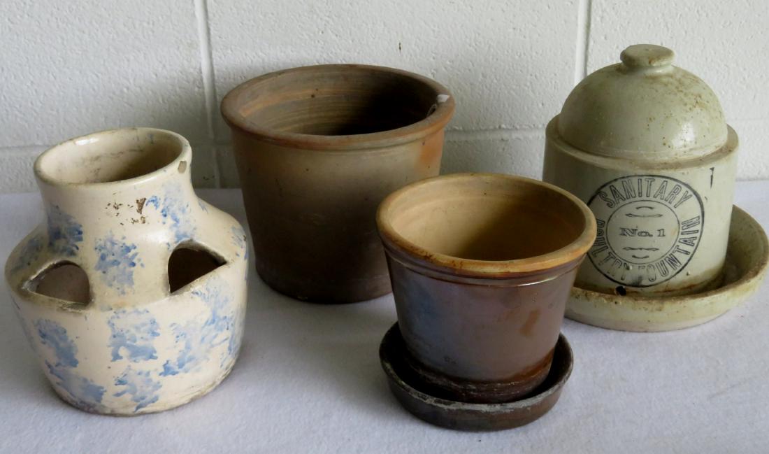 Four pieces of redware/stoneware including: 1) Flower: Four pieces of redware/stoneware including: 1) Flower pot with brown manganese glaze and applied slip decorations - small hairline extending from rim, otherwise good condition; 2) A redware flower pot