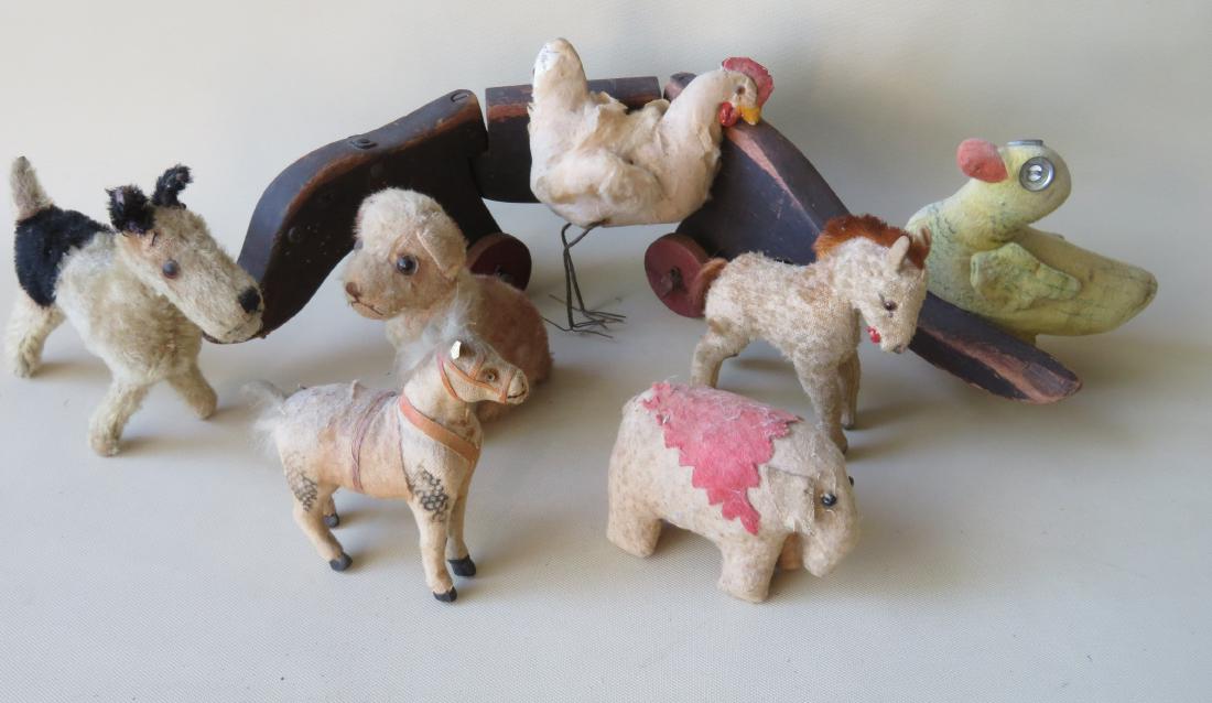 Grouping of 8 vintage animal toys including 7 small: Grouping of 8 vintage animal toys including 7 small stuffed animals and 1 Dachshund wooden pull toy in original brown paint - some paint wear and chip to tail, but overall good condition - 23"L. The s