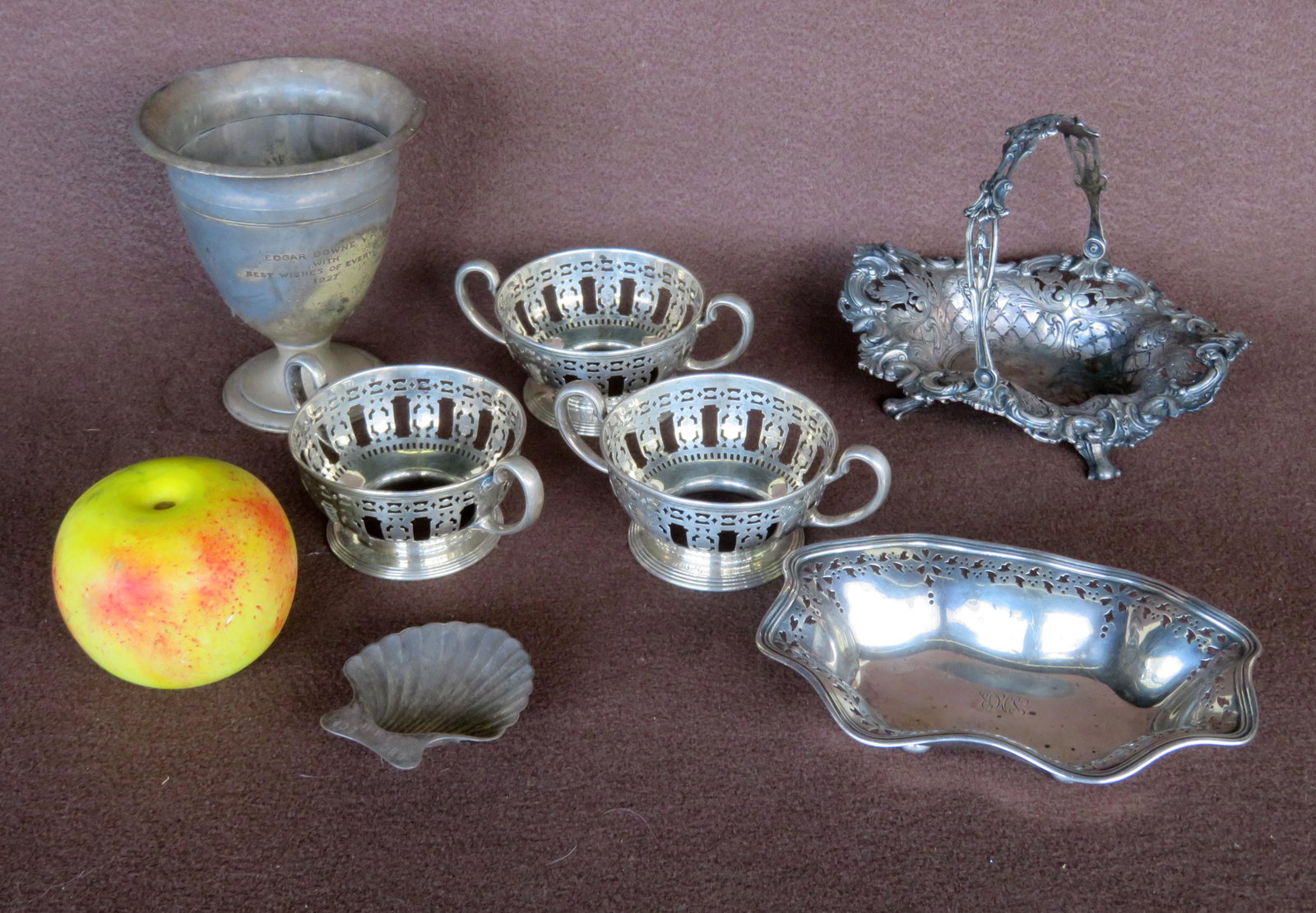 Seven pieces of Tiffany & co. sterling silver: Seven pieces of Tiffany & co. sterling silver including: Small loving cup engraved "Edgar Bowne, V.P. / With / Best Wished of Everyone / 1927" - 5"H; 3 pierced double handle cup holders; small shell s