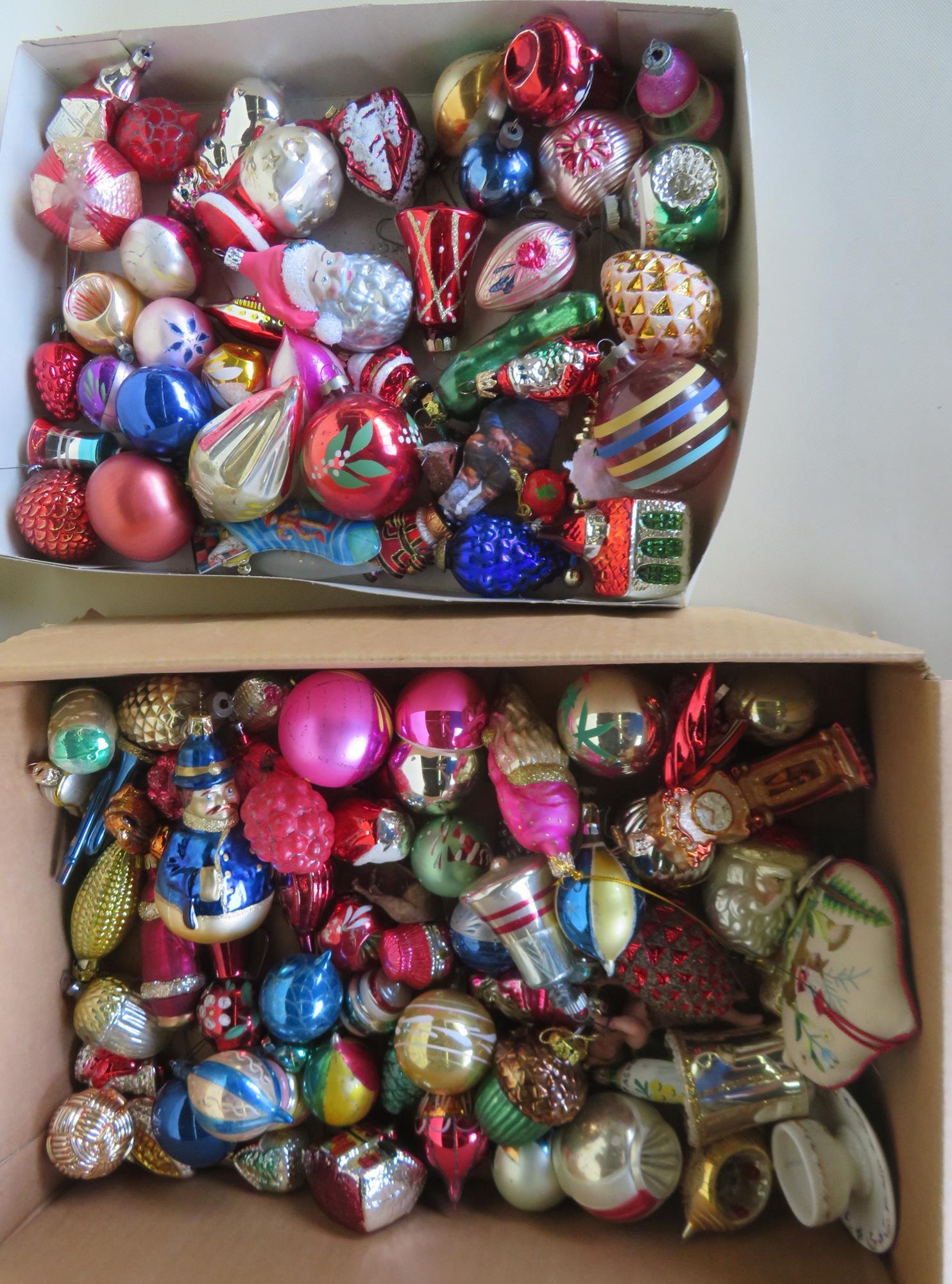 A large grouping of mostly glass Christmas balls, mid: A large grouping of mostly glass Christmas balls, mid to late 20th century, including some figural. The grouping includes one kugel which appears to be newer and not antique. All in very good conditio