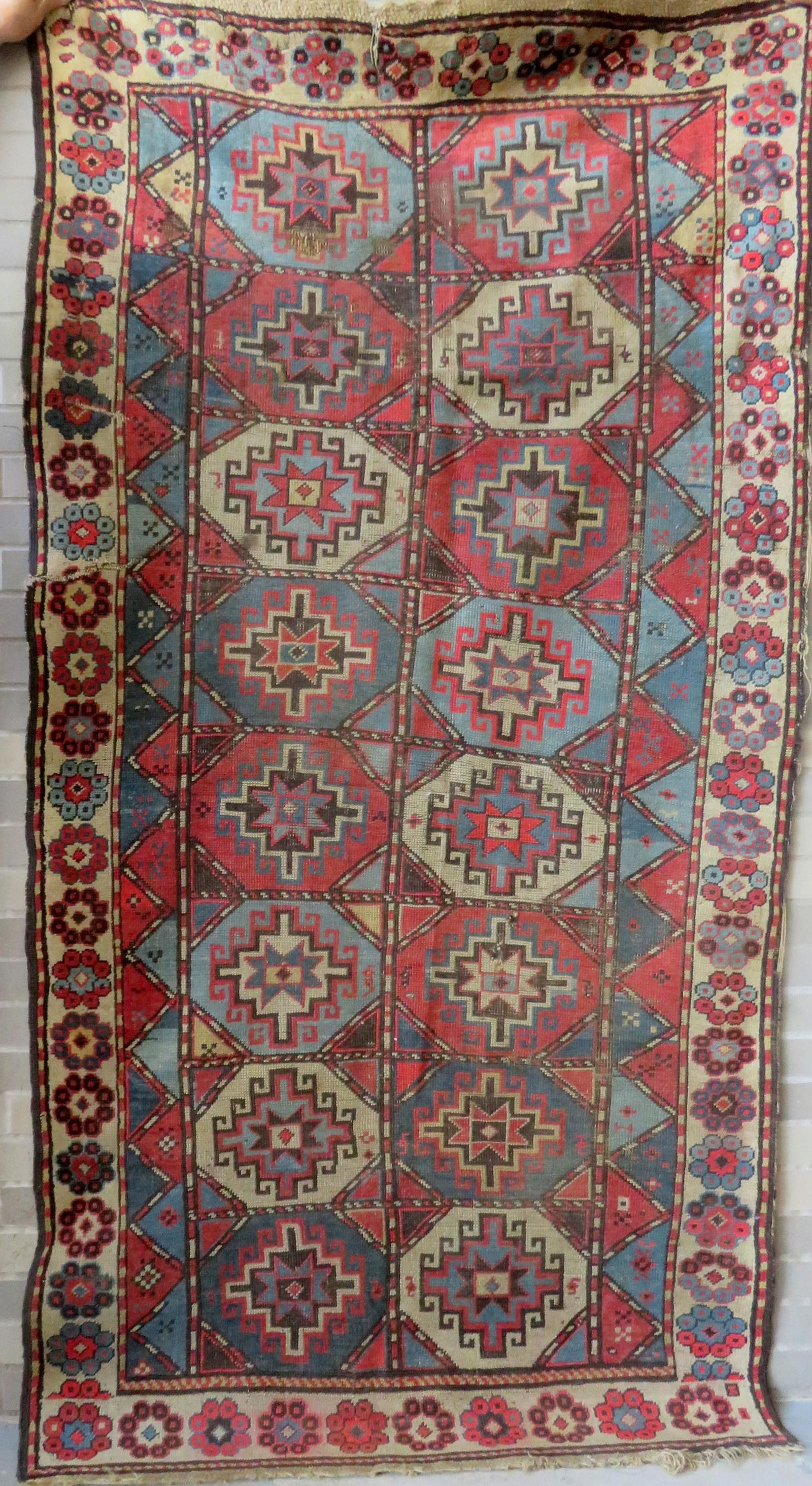 Oriental scatter rug, 3' 9" x 7' 1". Two small 1/2"D: Oriental scatter rug, 3' 9" x 7' 1". Two small 1/2"D holes, small fabric separation on one border, and small slit on one end, slight use wear, overall good condition. Late 19th century.