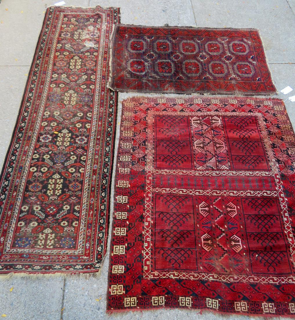 Three oriental rugs with some damage, 19th century.: Three oriental rugs with some damage, 19th century. Including: 1) A scatter rug with wear and several small holes less than 1"D - 5' 3" x 3' 4"; 2) A runner with a small wear area on one end also with