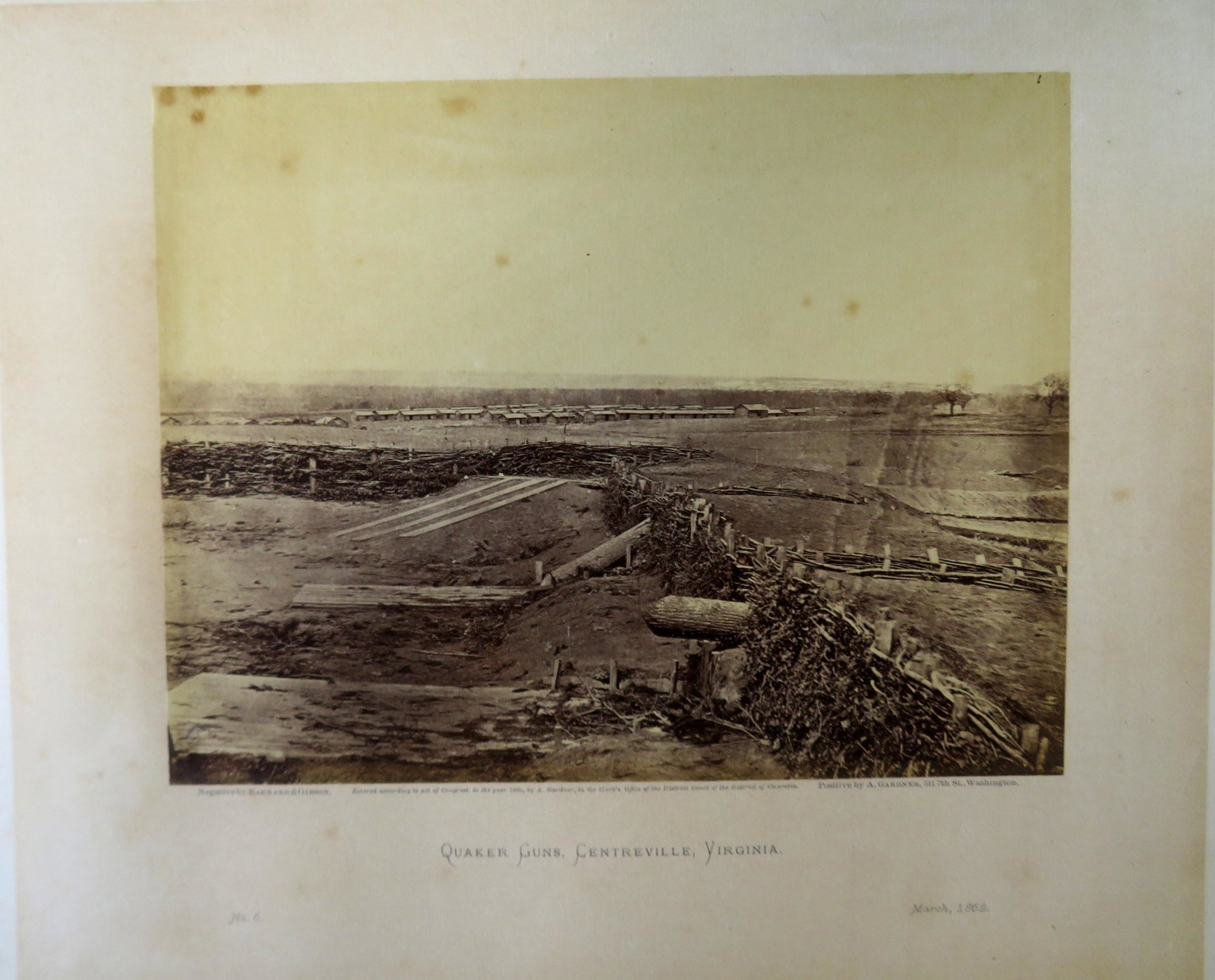 George N. Bernard, American 1819-1902 and Alexander: George N. Bernard, American 1819-1902 and Alexander Gardner, NY & Washington DC, 1821-1882 - Civil War photographers. Albumen print entitled "Quaker Guns, Centreville, Virginia. / March 1862". Marked